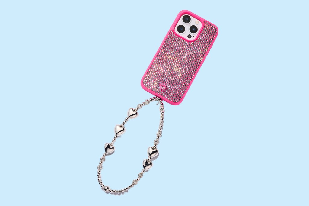 A pink phone case with a decorative chain